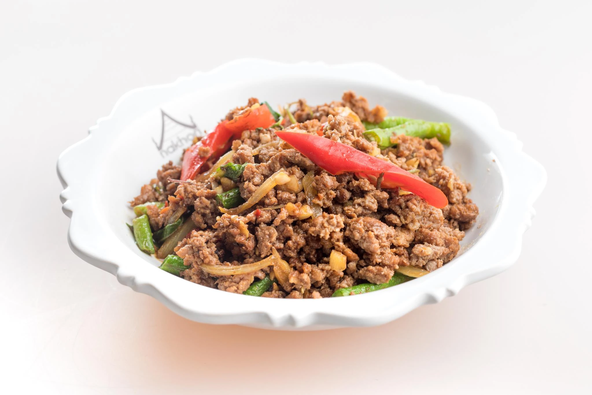 Stir-fried minced beef with hot basil leaves