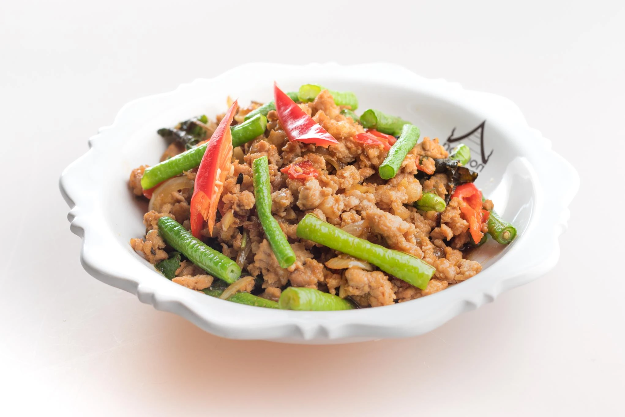 Stir-fried minced pork with hot basil leaves