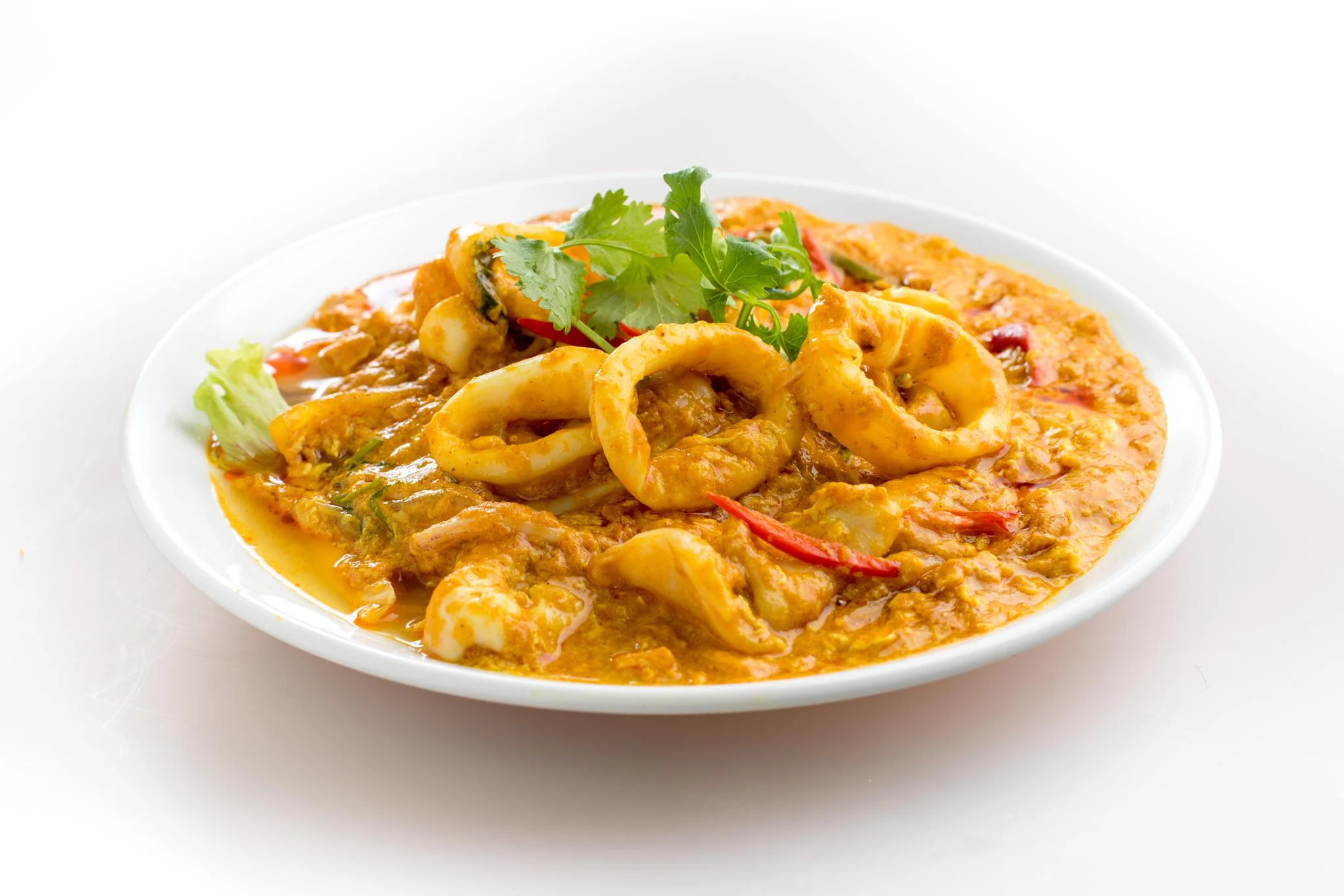 Stir-fried squid with Thai yellow curry powder